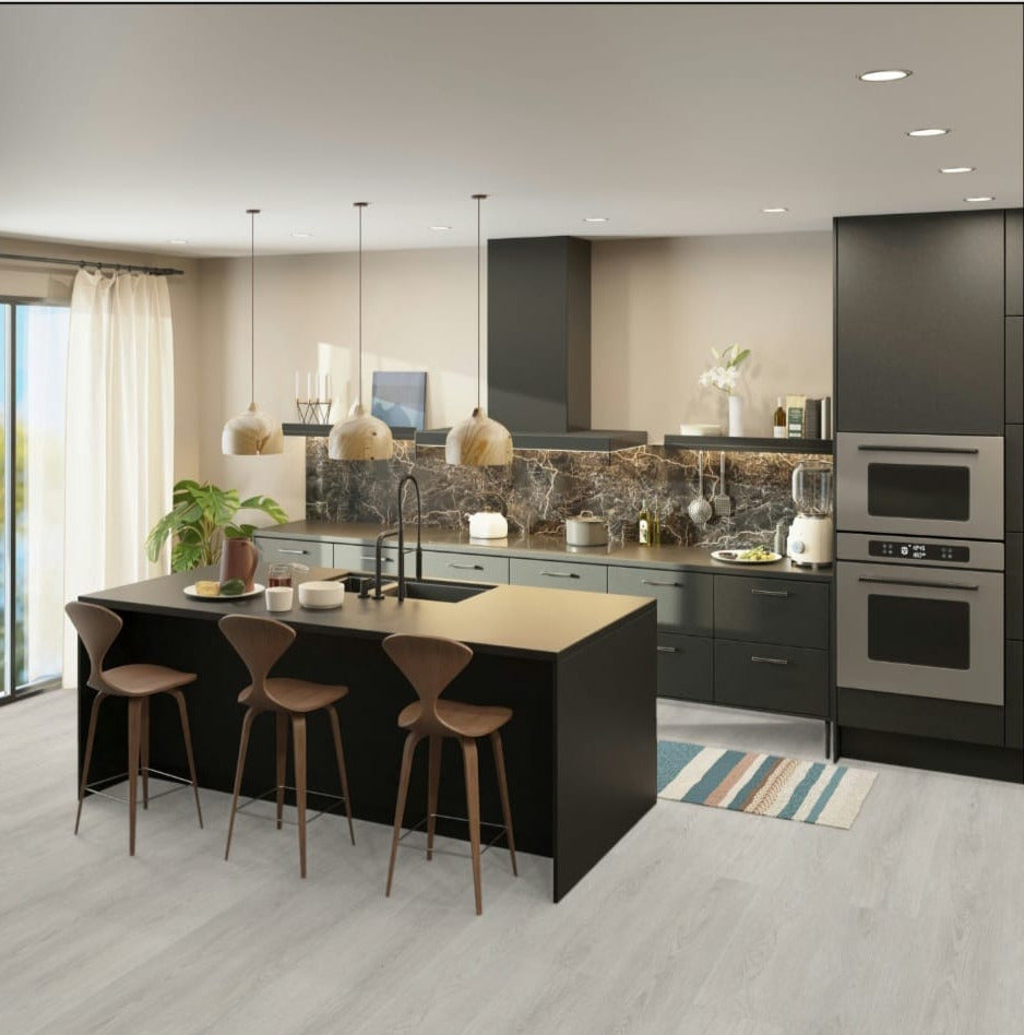 Modern kitchen with black island and gray flooring, featuring the color 'Blass Gray'.