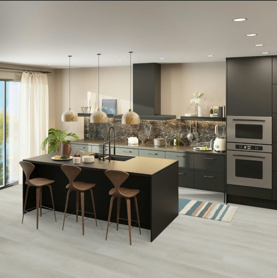 Modern kitchen with black island, gray cabinets, and Perla flooring label.